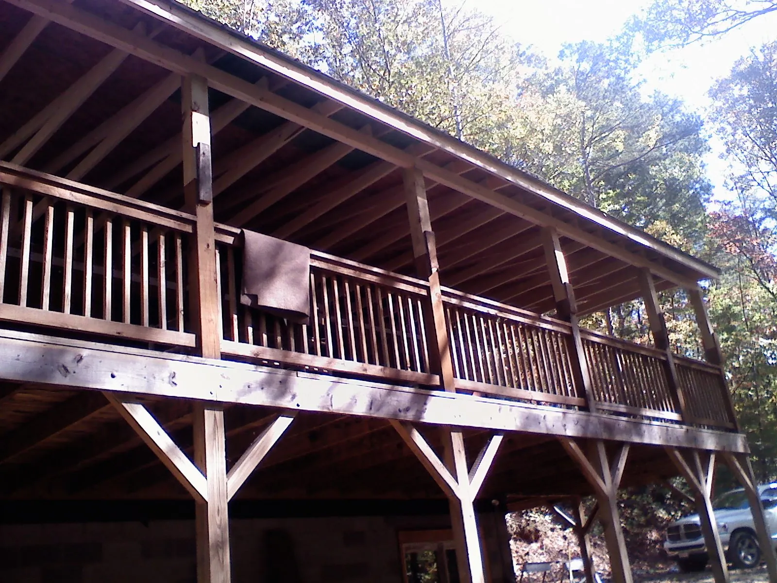 Timber framing under a new elevated porch and deck — Roof Leak Repair in Newbury Park by Roofing Brothers